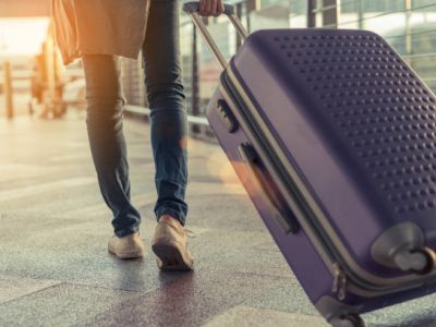 istockphoto-874914576-612×612 Traveler with suitcase in airport concept.Young girl walking with carrying luggage and passenger for tour travel booking ticket flight at international vacation time in holiday rest and relaxation.